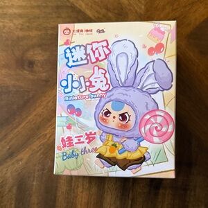 Baby three miniature bunny with an outfit blind box